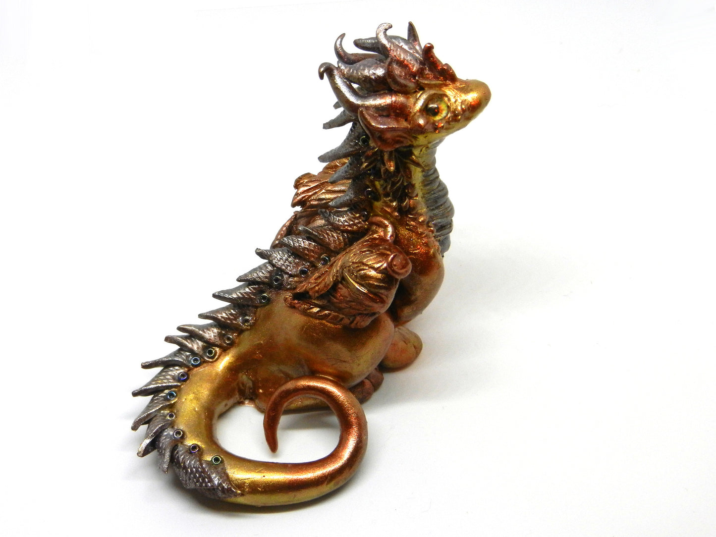 Gold and silver sitting down dragon unique figurine