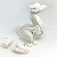 Unpainted sitting down dragon figurine to customize