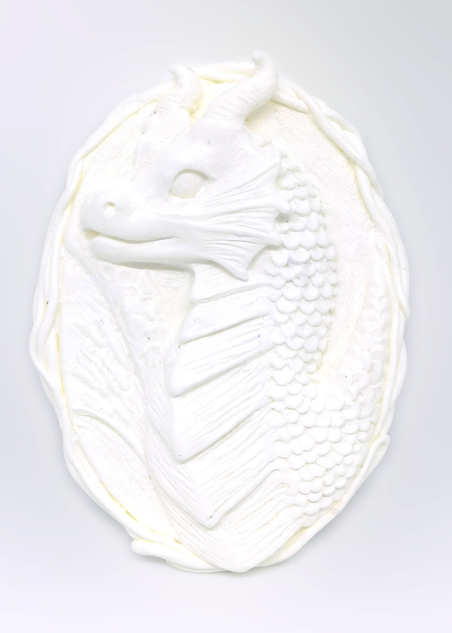 Unpainted dragon oval magnet portrait