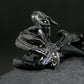 Black dragon laying down unique figurine