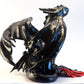 Black dragon sitting down unique figurine