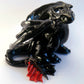 Black dragon sitting down unique figurine