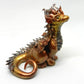 Gold and silver sitting down dragon unique figurine