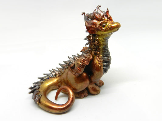 Gold and silver sitting down dragon unique figurine