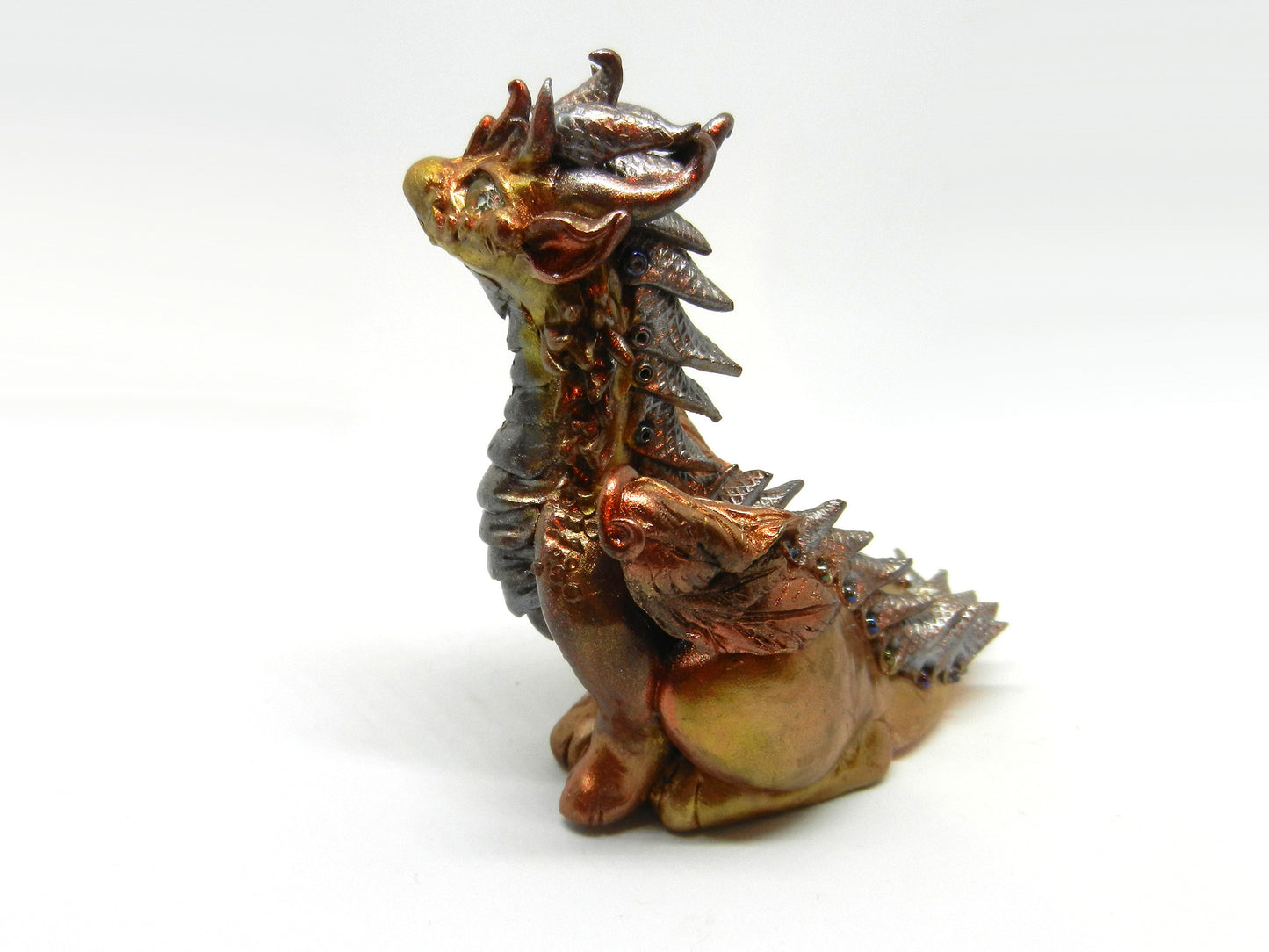 Gold and silver sitting down dragon unique figurine