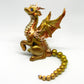 Light gold unique figurine with moveable tail