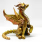 Light gold unique figurine with moveable tail