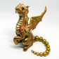 Light gold unique figurine with moveable tail