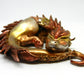 Sleeping golden dragon unique figurine