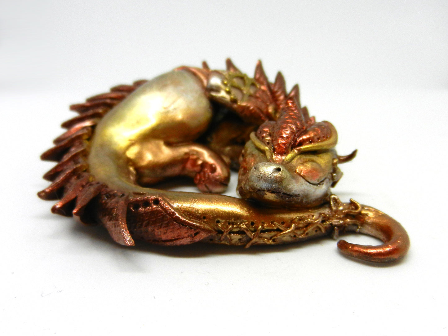 Sleeping golden dragon unique figurine