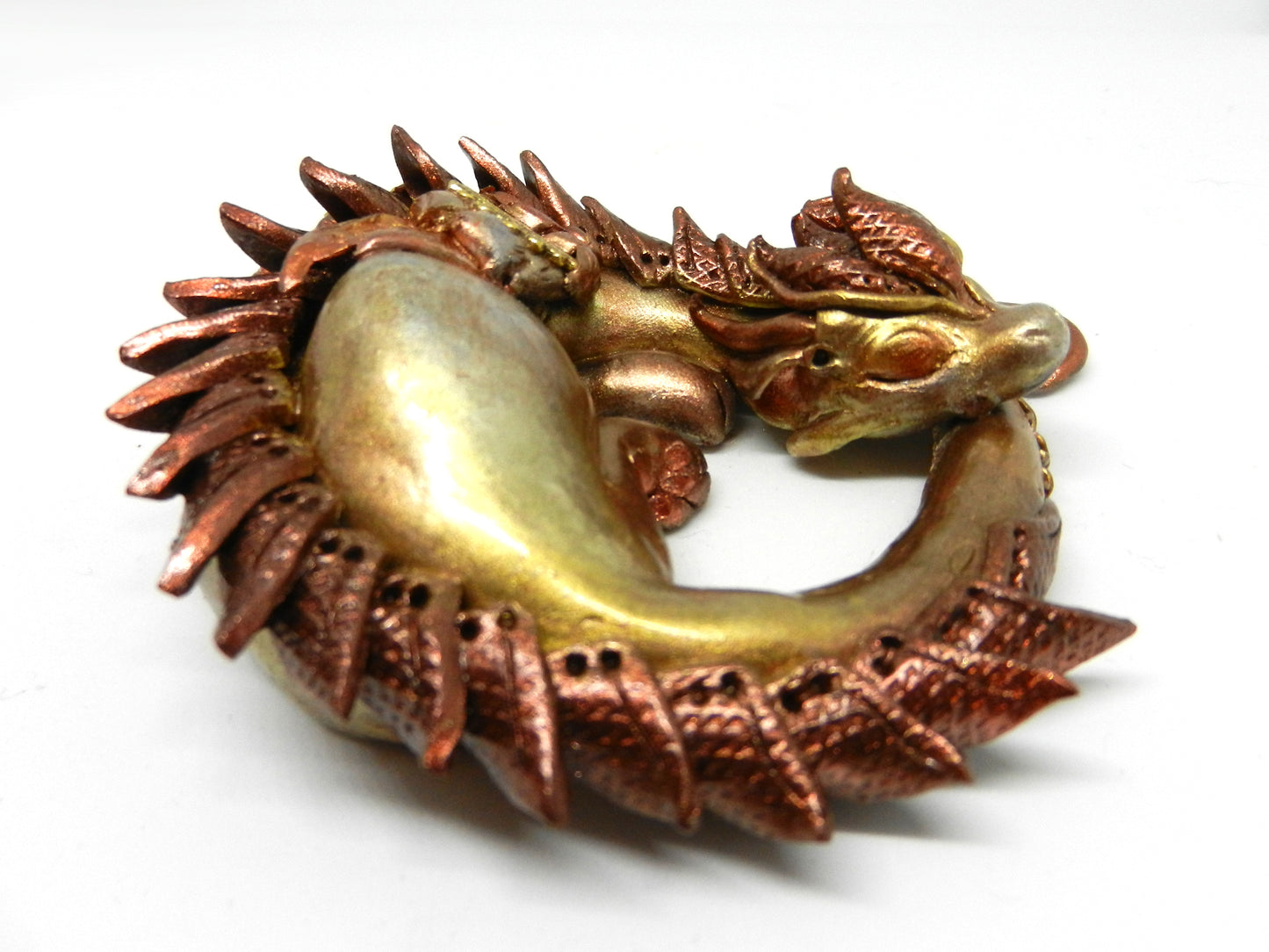 Sleeping golden dragon unique figurine