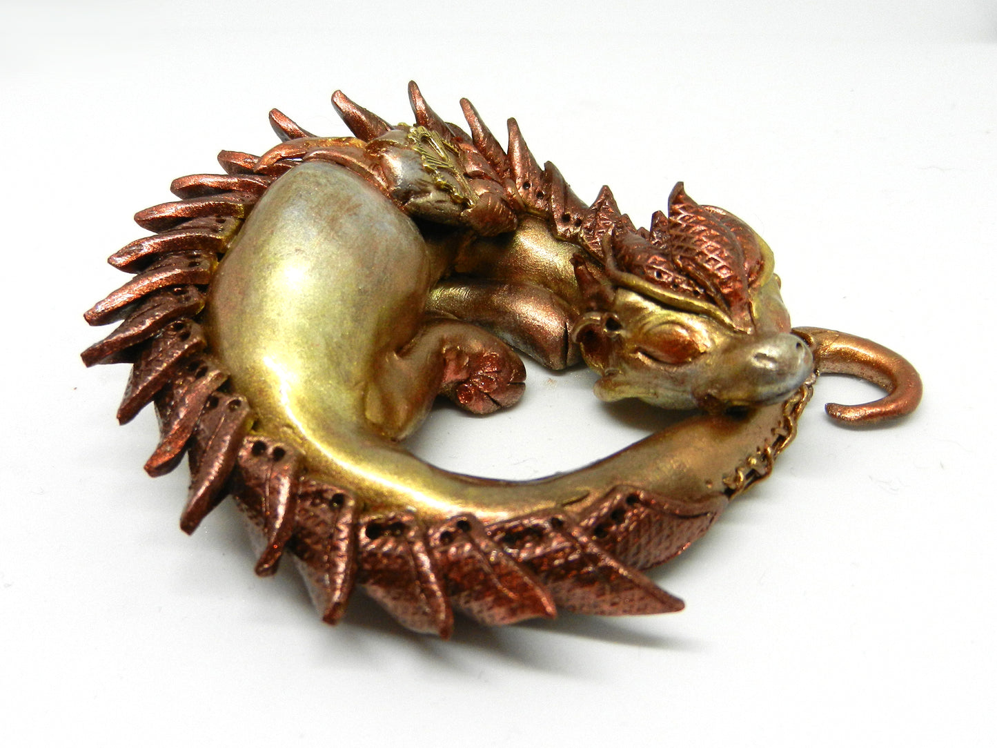 Sleeping golden dragon unique figurine