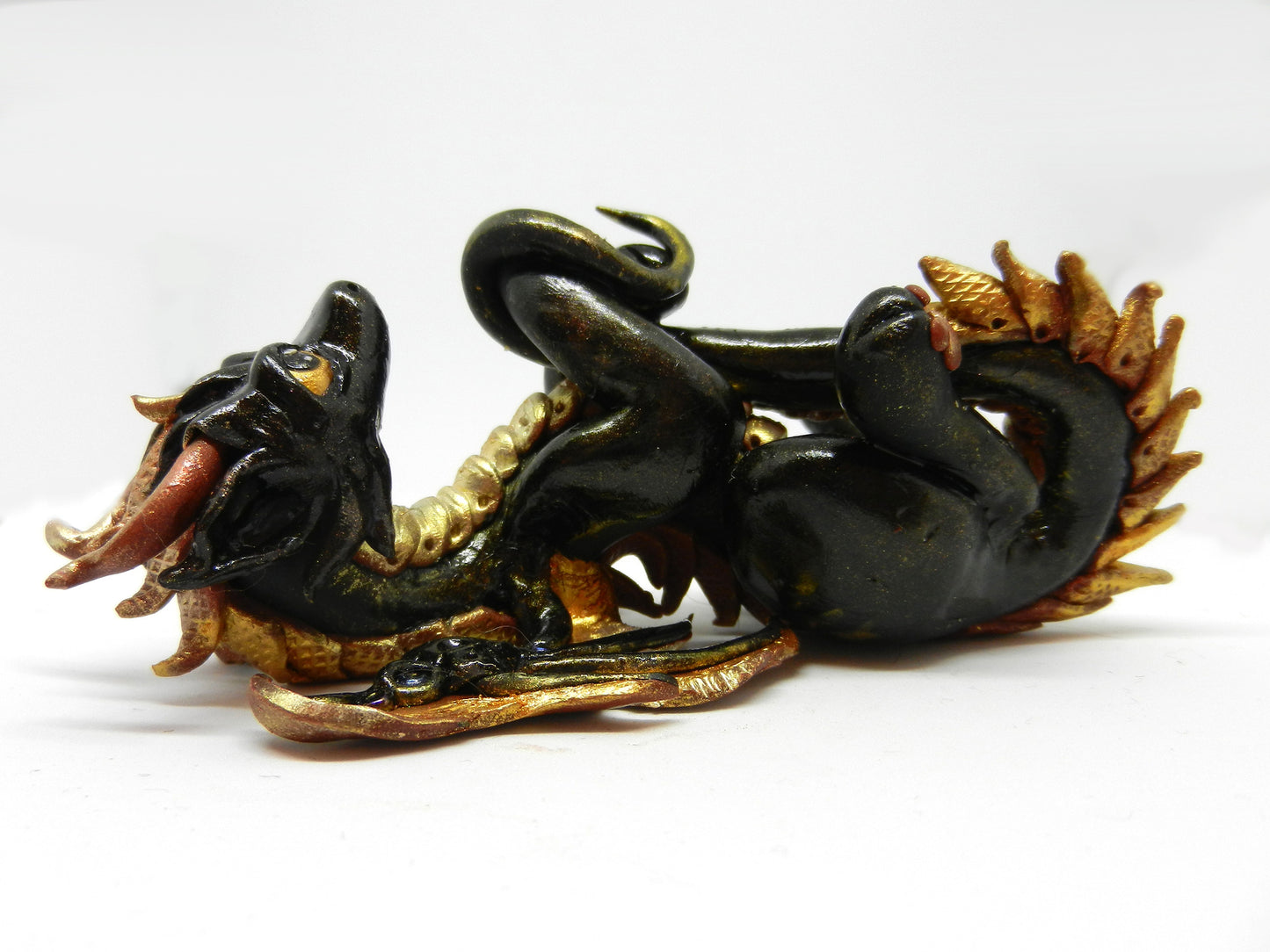 Black and gold dragon unique figurine