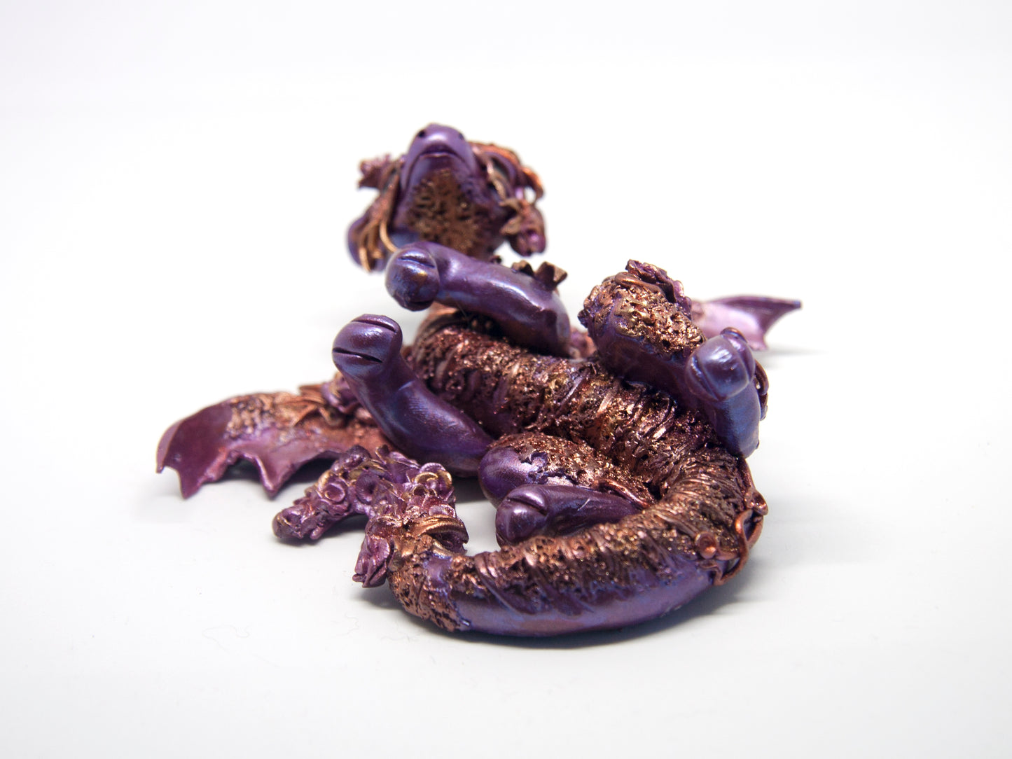 Violet and copper dragon unique figurine with floral design