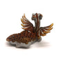 Figurine of a dragon laying down