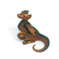 Figurine d'un dragon assis