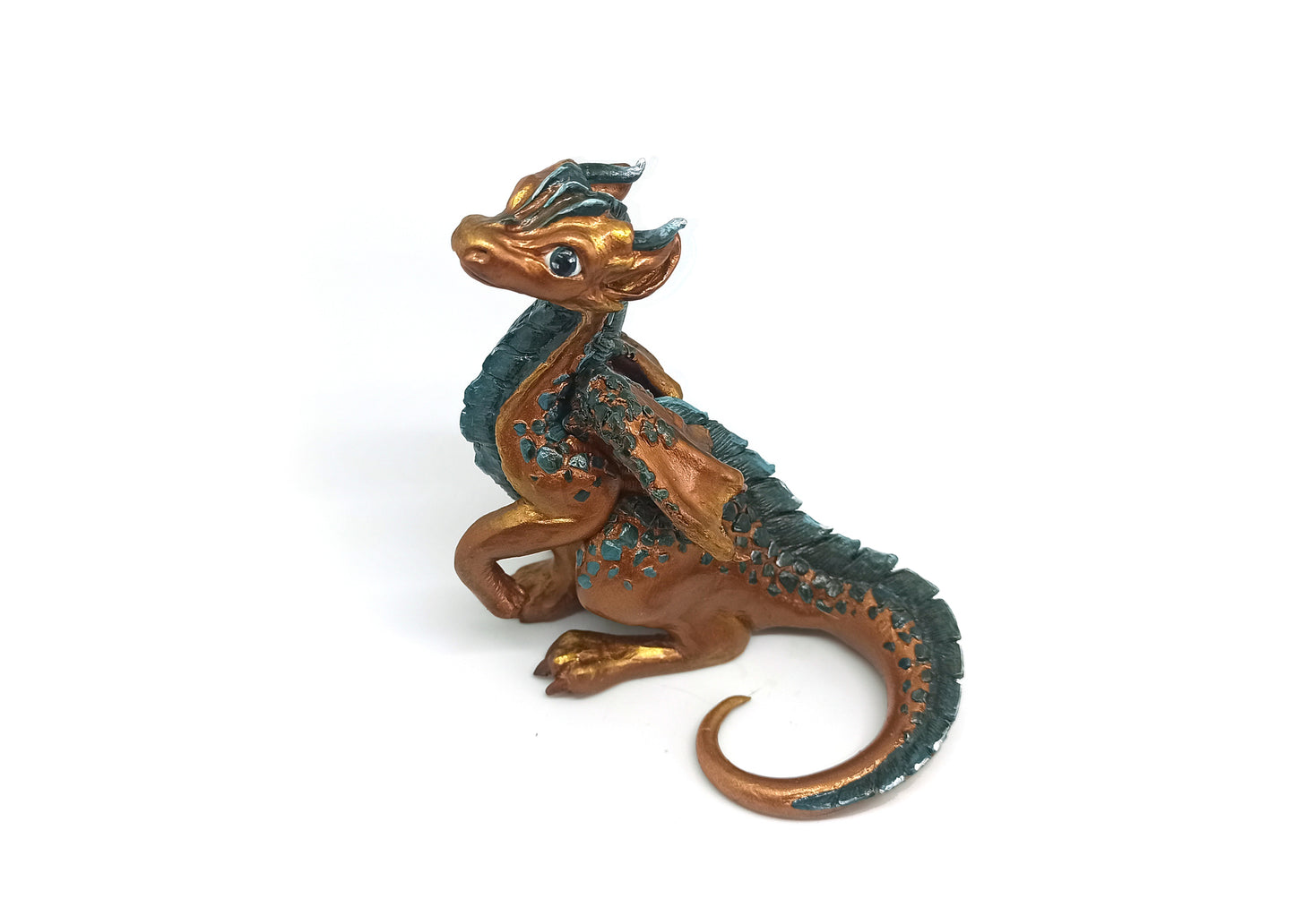 Figurine of a sitting down dragon