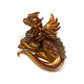 Figurine of a dragon laying down