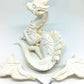 Unpainted laying down dragon figurine to customize