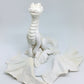 Figurine blanche d'un dragon puissant à peindre soi même