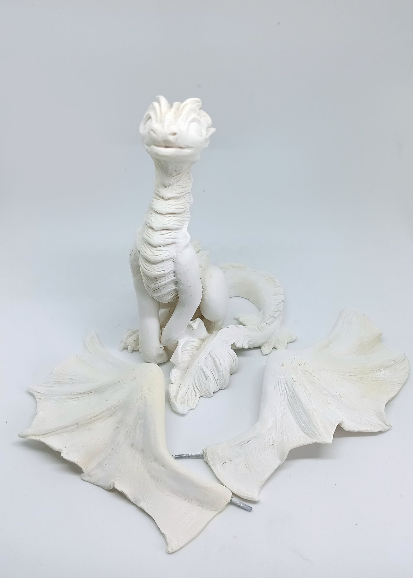 Unpainted mighty dragon figurine to customize