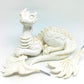 Unpainted laying down dragon figurine to customize