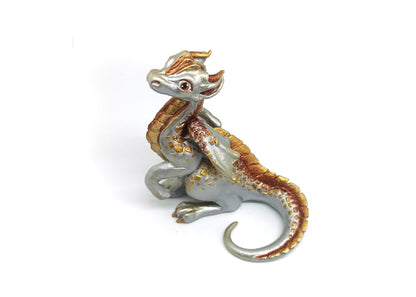 Figurine of a sitting down dragon