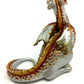 Figurine d'un dragon assis