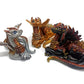 Figurine of a dragon laying down